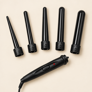 Black curling wand handle and five interchangeable ceramic barrels arranged on a warm neutral background.