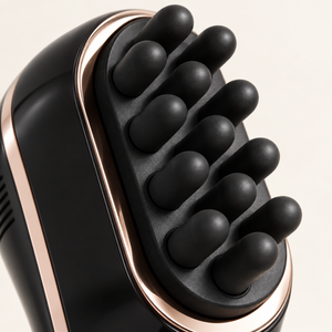 Close-up of the scalp comb rounded black silicone massage tips