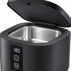 Close-up of the 300ml stainless-steel cleaning tank with the lid open