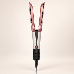 Open view of the pink air hair straightener showing both inner arms