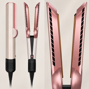 Detail presentation of the pink air straightener airflow slots and inner arms