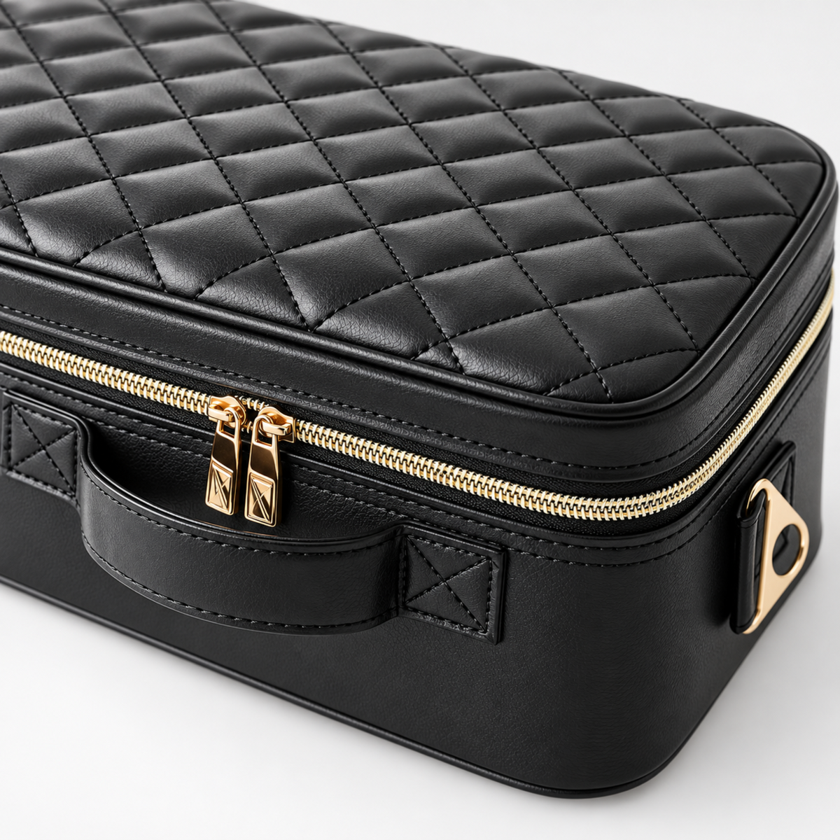 Close-up of the makeup case diamond quilting and rounded lid corner