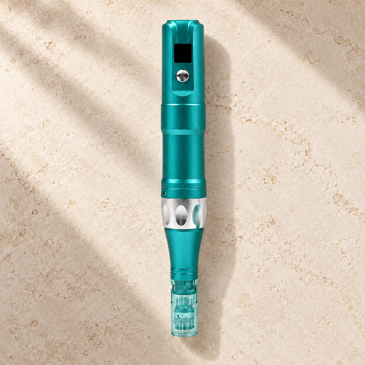 Teal A6S cordless microneedling pen on a neutral stone surface