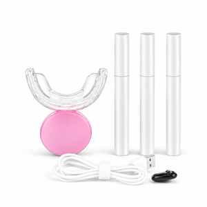 Pink LED whitening kit on a white background