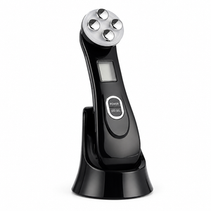 Black facial device on a white background