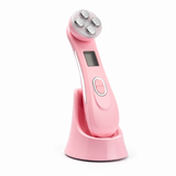Pink facial device on a white background