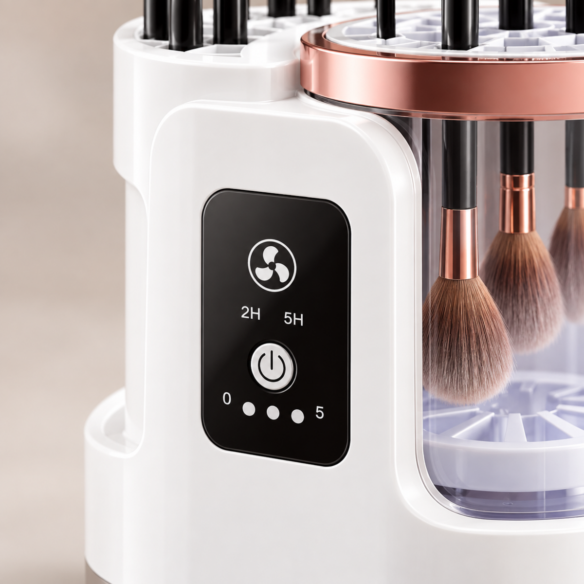 Close-up of the makeup brush cleaner control panel and clear cleaning chamber.
