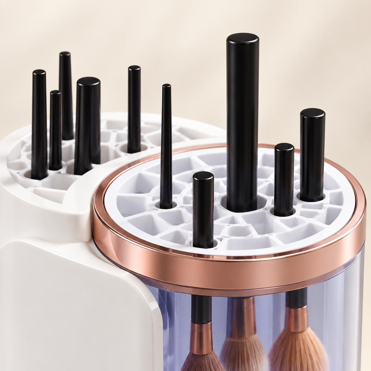 Detail of the integrated makeup brush holder and storage openings on the cleaning station.