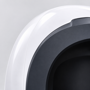 Close-up of the facial analyser white shell and charcoal oval rim