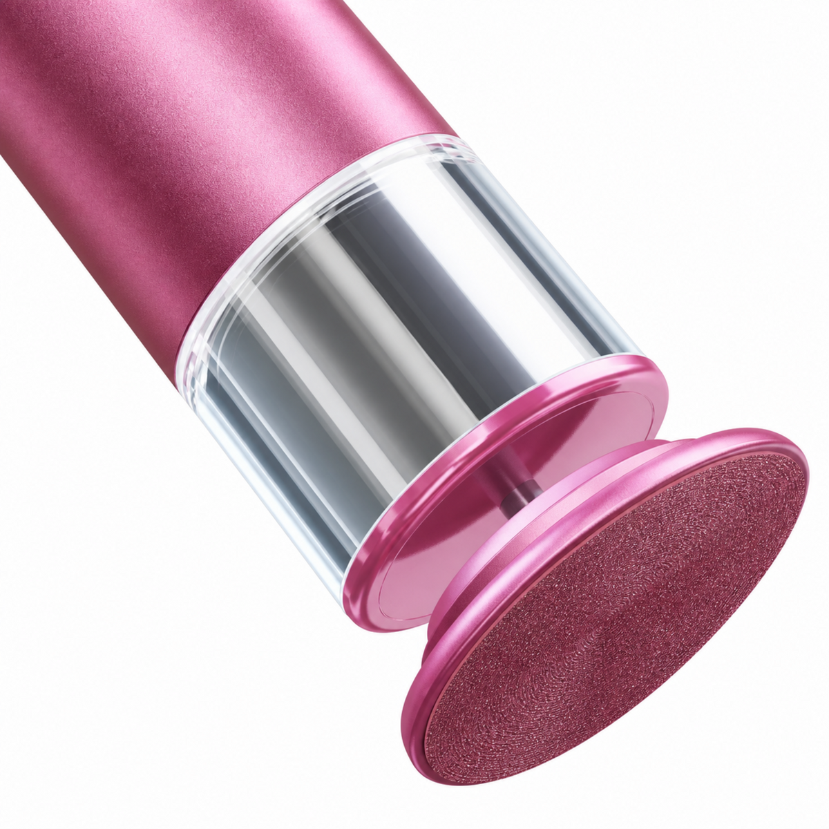 Close-up of the circular abrasive disc and metallic pink head of the electric foot file.