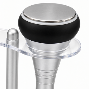 Detail of the flat circular ultrasound handpiece with silver disc, black collar and clear holder.