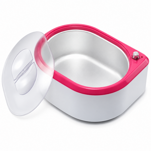 Overhead view of the paraffin wax bath showing its smooth oval basin and clear removable lid.