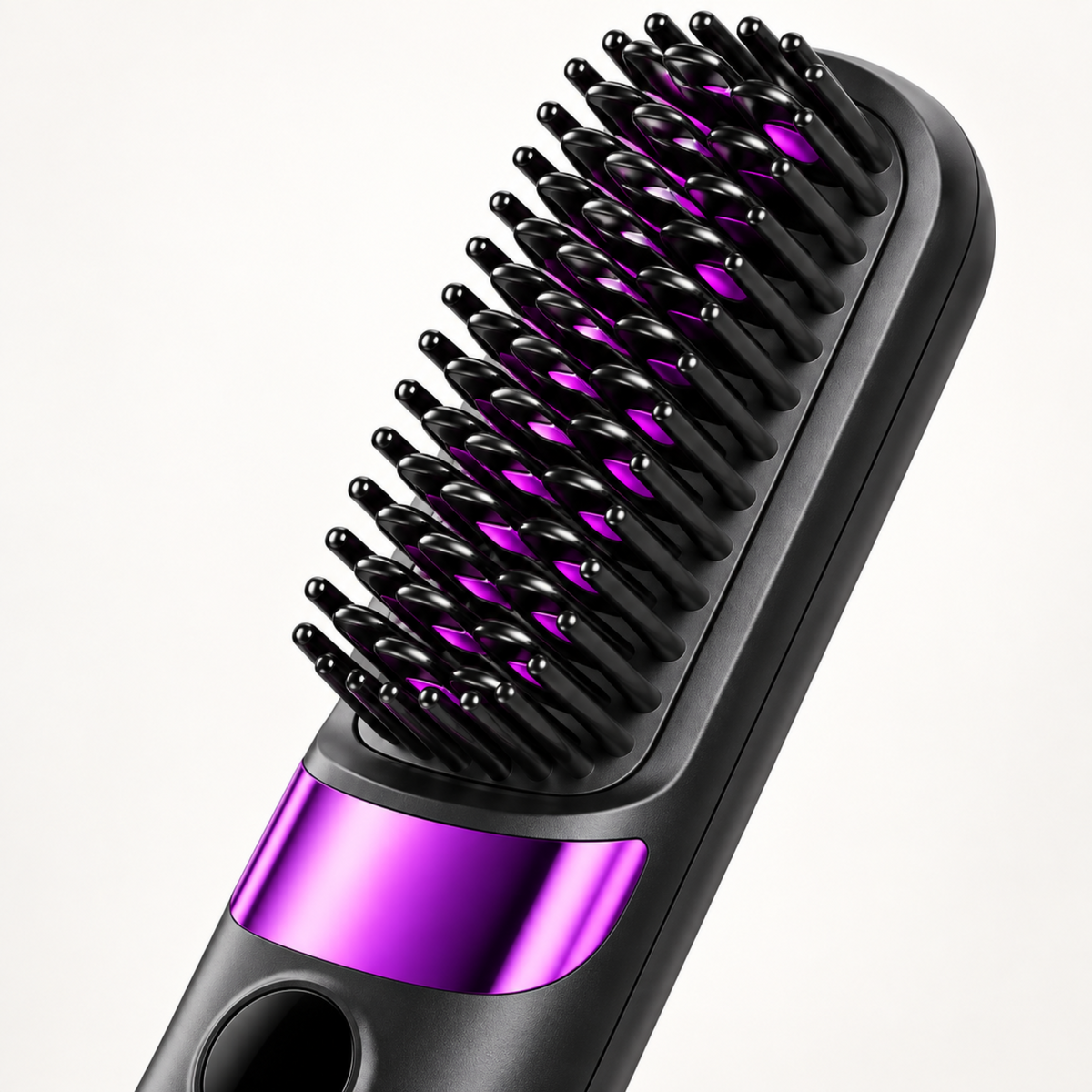 Close-up of the hair straightening brush head with black teeth and purple details