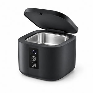 Black 300ml ultrasonic jewellery cleaner with open lid and stainless-steel tank on a white background
