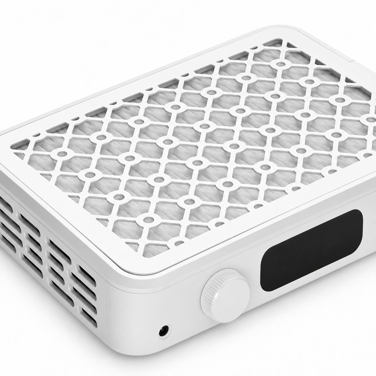 Close-up of the patterned removable grille and filter area of the nail dust collector