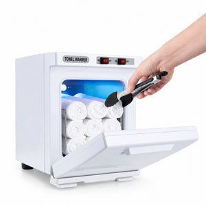 Open white towel warmer with a hand using tongs to handle a towel; towels and tongs shown for illustration